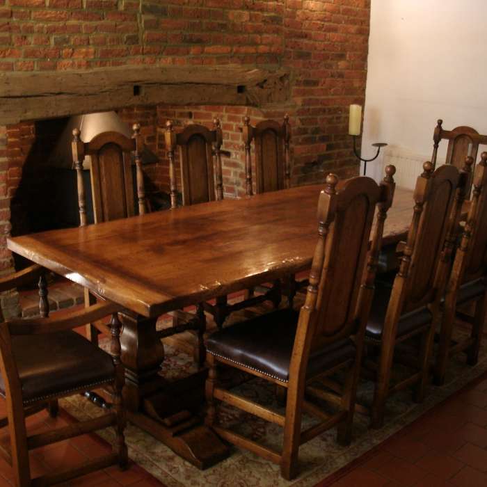 Square Column Table with Panel Back Chairs in Tudor Finish