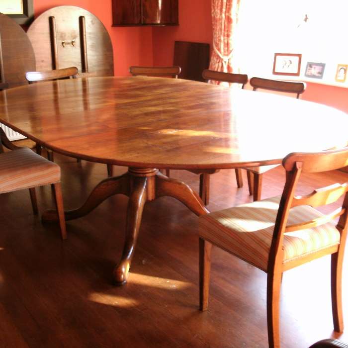 Round Pedestal extending table in our Tudor finish 