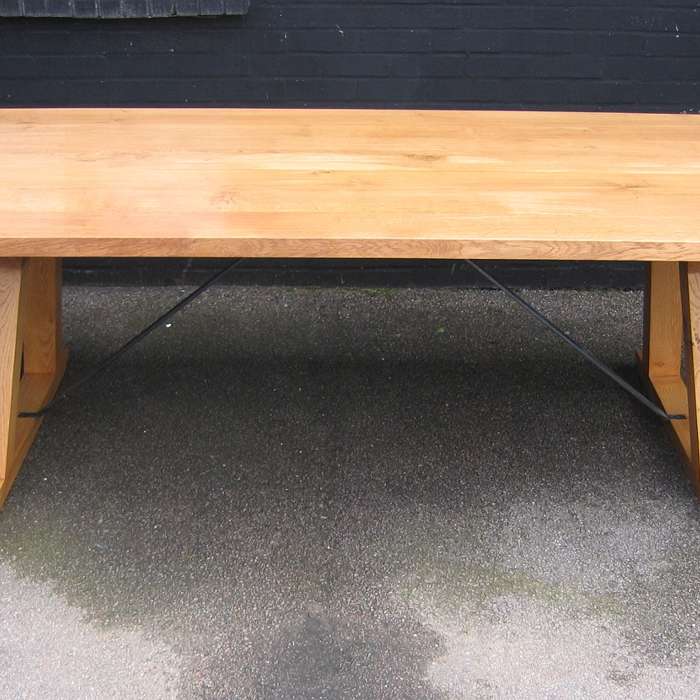 Solid oak dining table with cleated ends in our natural finish