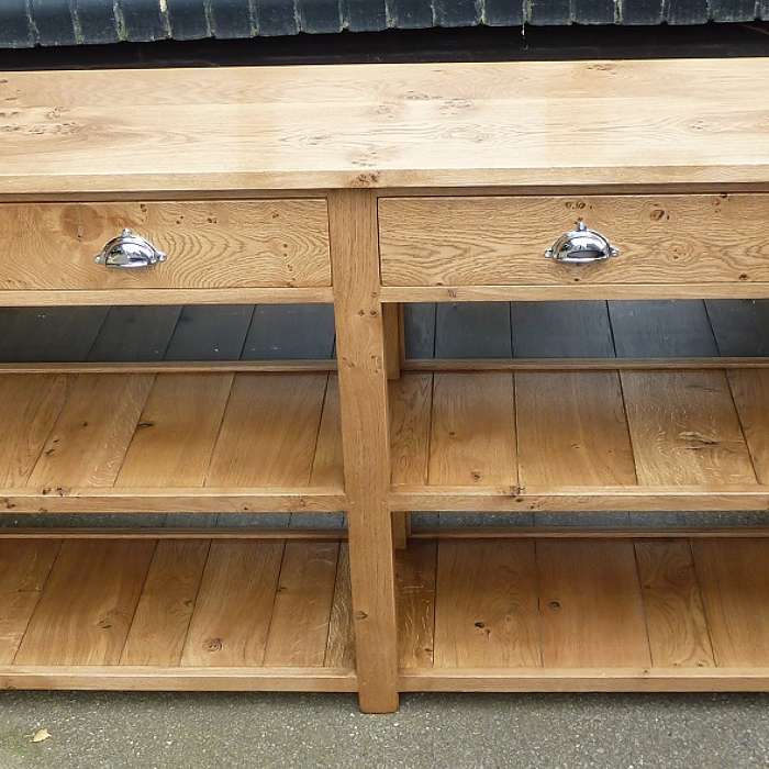 Four drawer side board with two pot board shelves
