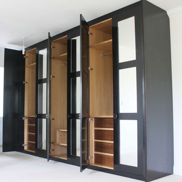 Large painted fitted wardrobe with interial fittings