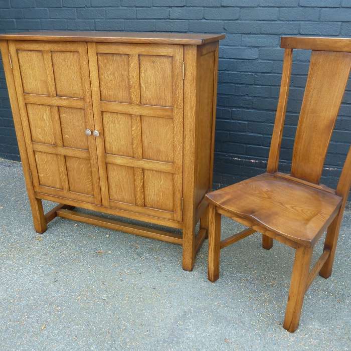 Two door cabinet with matching curved back chairs