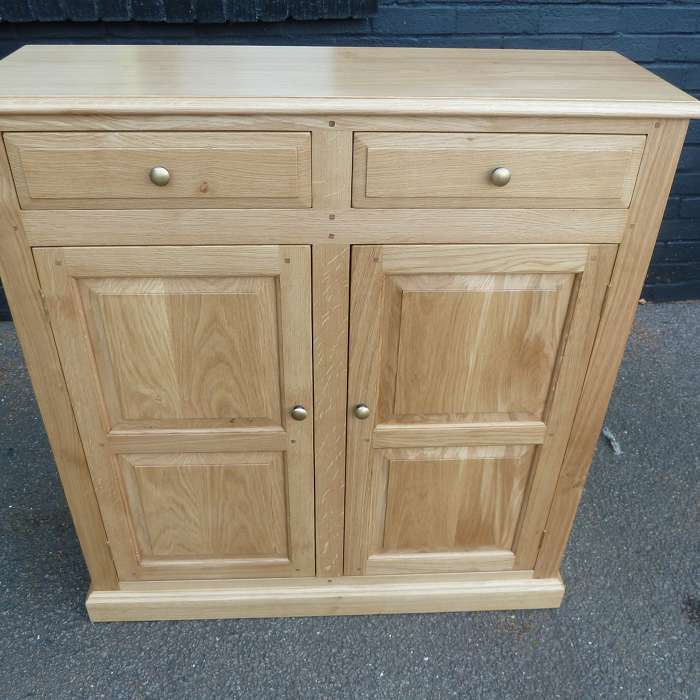 Two door cabinet with drawers in our fumed finish
