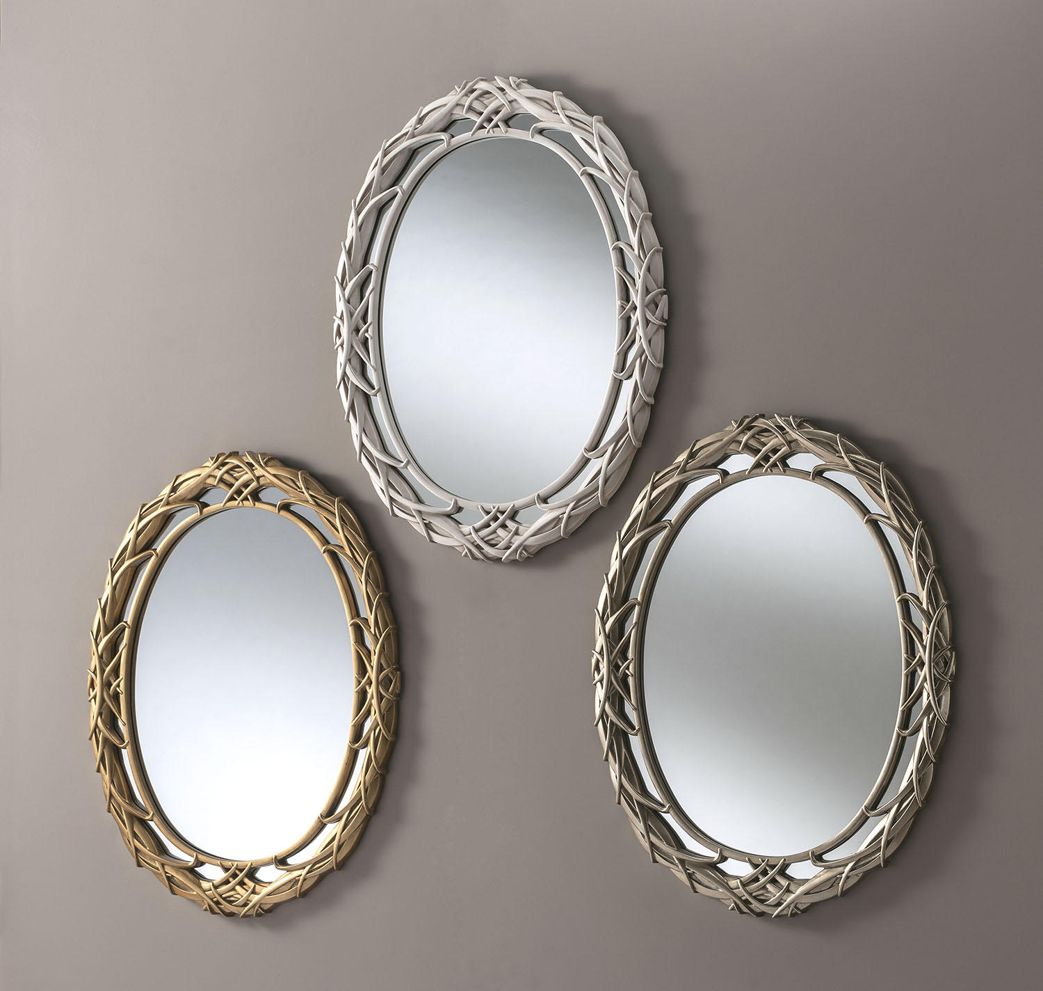 Oval carved wall mirrors